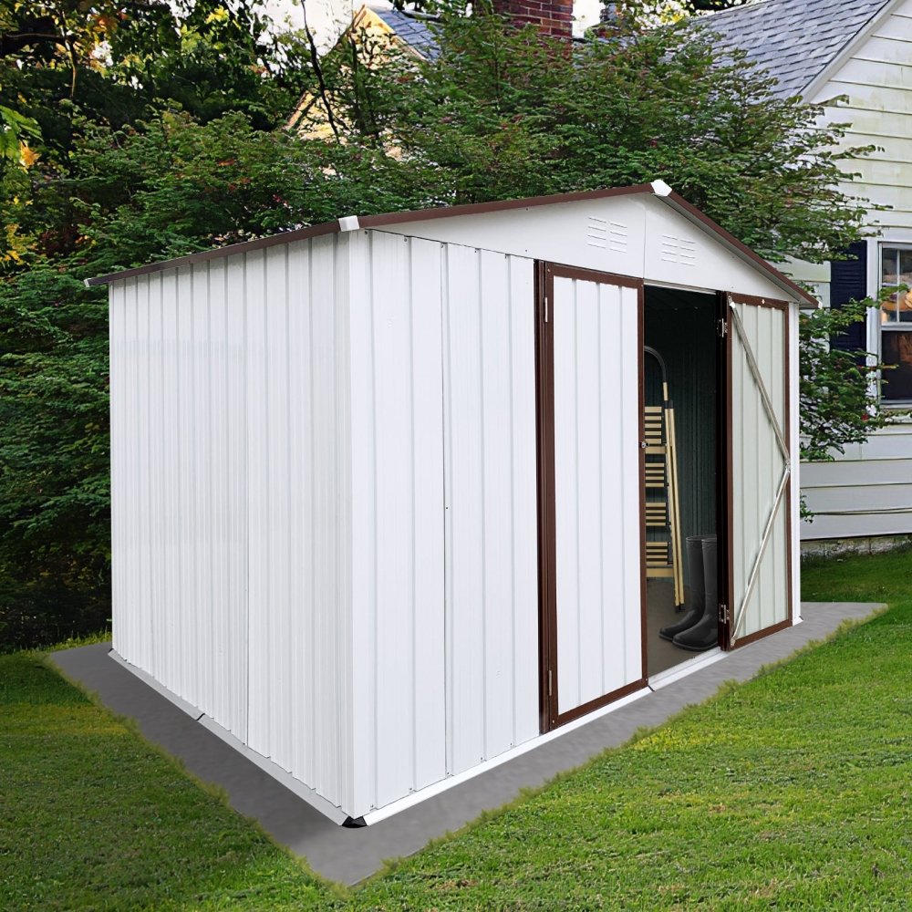 White outdoor storage shed with an open door, placed in a backyard garden, providing secure storage space for tools and equipment.