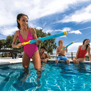 WOW Watersports Splash Cannon water toy 12-pack; people in an outdoor pool play with blue and yellow cannons.