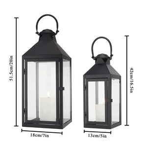 Set of 2 JHY DESIGN black metal candle lanterns with glass panels; vintage style, 20in and 16.5in tall.