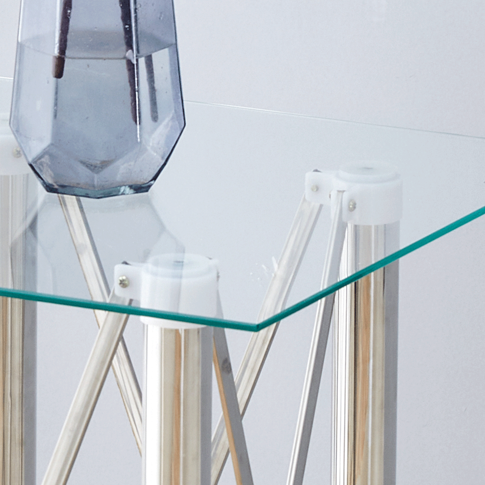 Elegant Expandable Square Glass Table - 36' Clear Tempered Glass, Silver Metal Legs.Telescopic metal legs, transparent square glass tabletop, suction cup attachment connection.