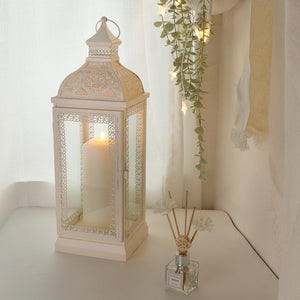 Rustic metal decorative candle lantern with tempered glass panels; 2 items shown (lantern and diffuser)