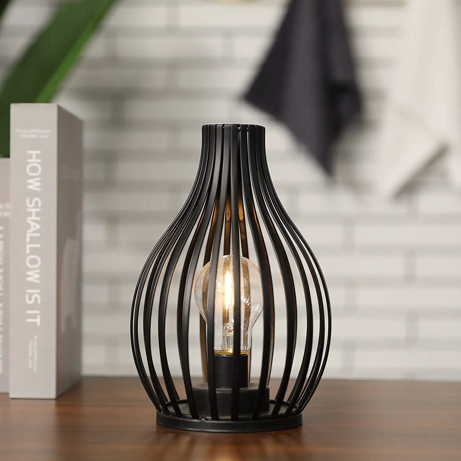 9.5-inch Battery-Powered Table Lamp by JHY DESIGN, black metal cage frame surrounding an Edison bulb