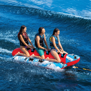 WOW Sub-Zilla 3-Person towable tube; red inflatable tube with three riders on blue water