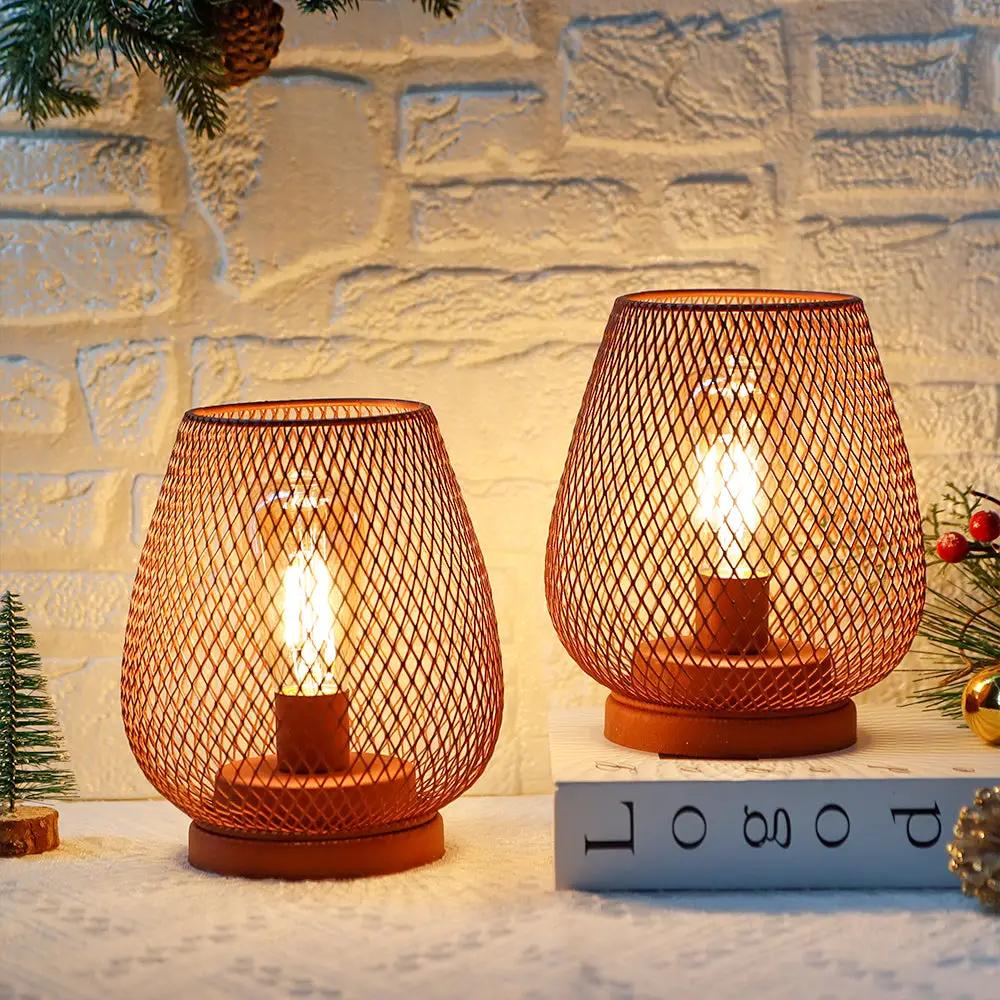 Cordless table lamps set of 2: 6.7in tall copper-toned metal cage lamps with exposed bulbs.
