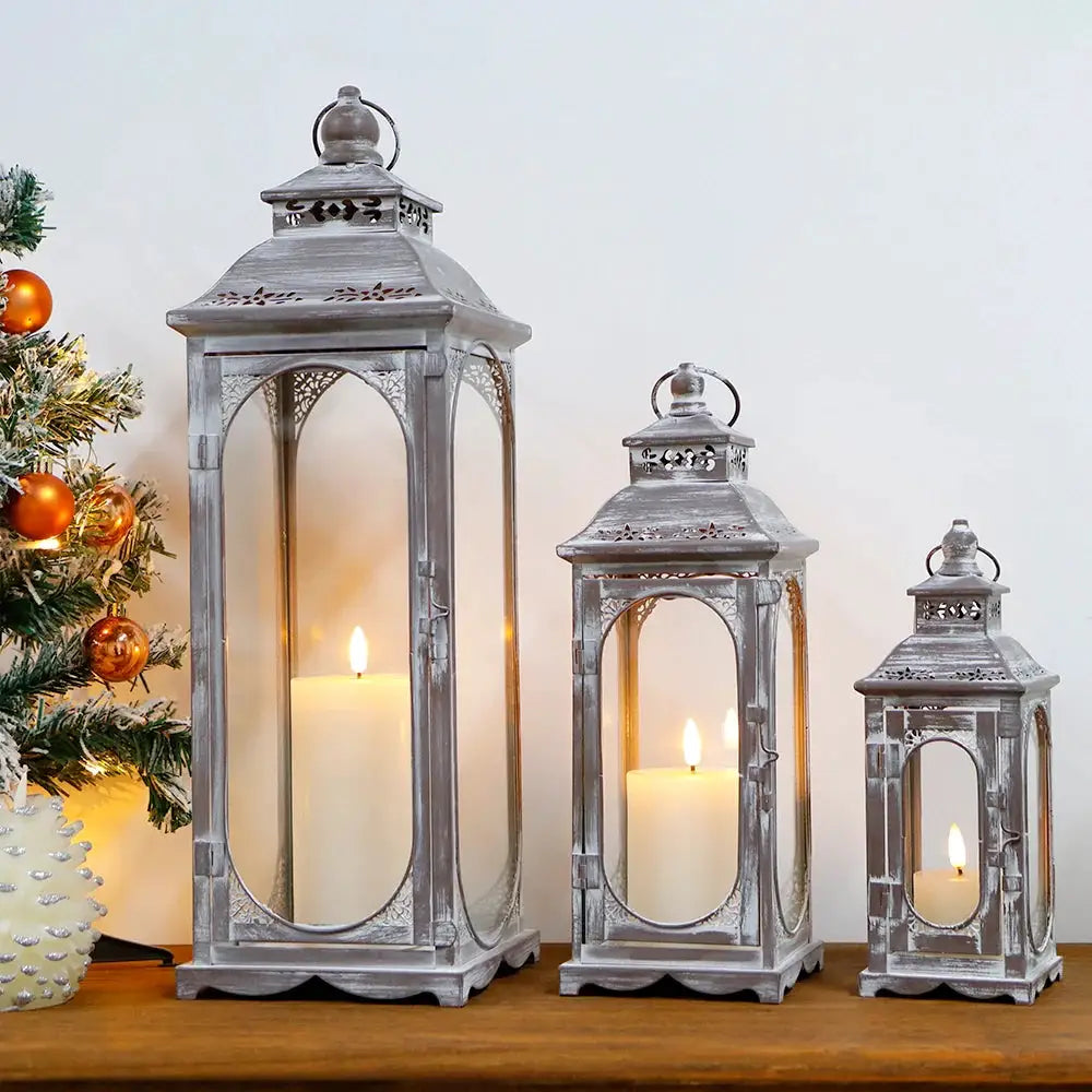Candle lanterns set of 3 in cement-gray metal by JHY DESIGN with glass panels, vintage style, lit candles