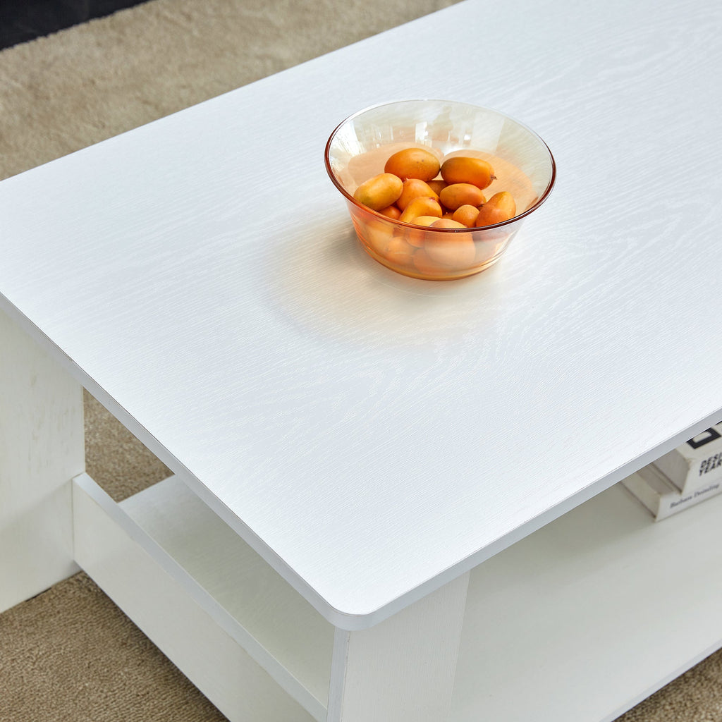 A modern and minimalist white double layered rectangular coffee table and coffee table. MDF material is more durable and suitable for living rooms, bedrooms, and study rooms. 19.6 "*35.4"*16.5 "CT-16