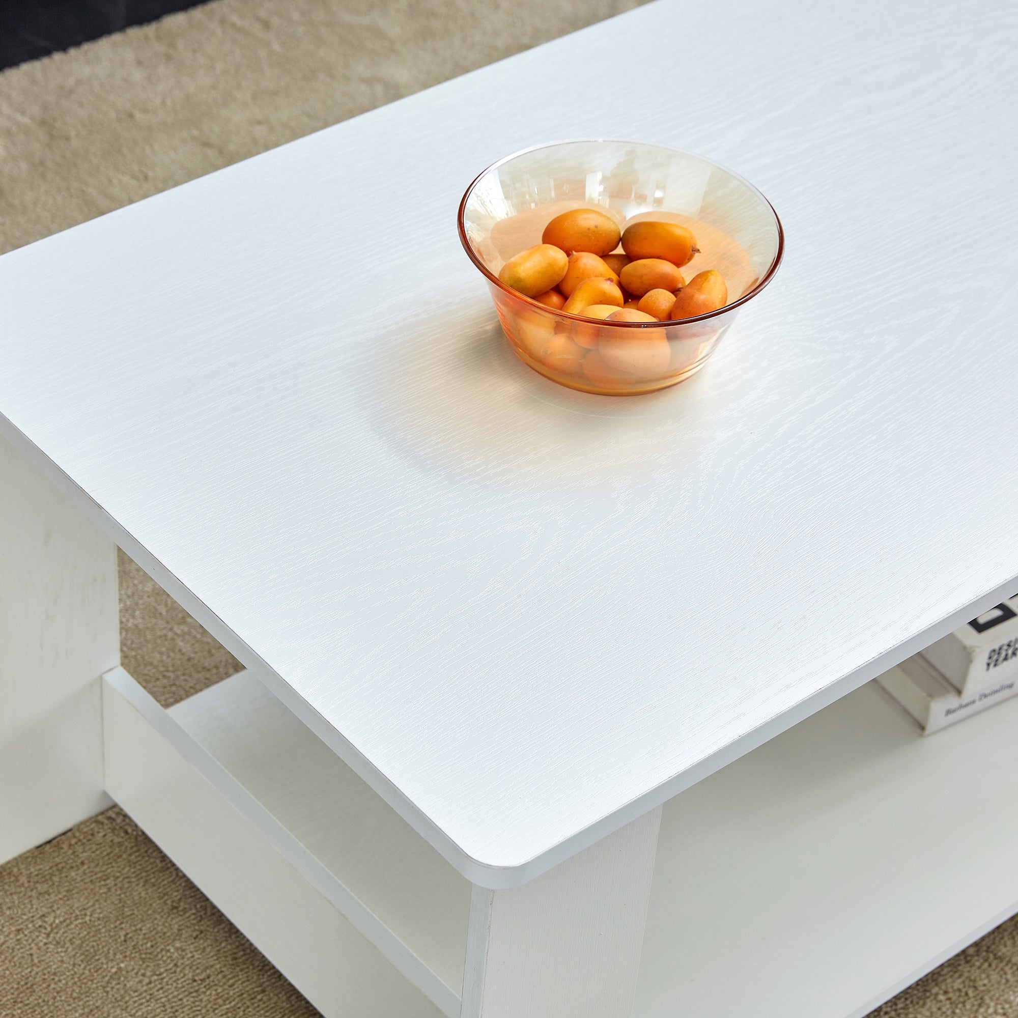 A modern and minimalist white double layered rectangular coffee table and coffee table. MDF material is more durable and suitable for living rooms, bedrooms, and study rooms. 19.6 "*35.4"*16.5 "CT-16