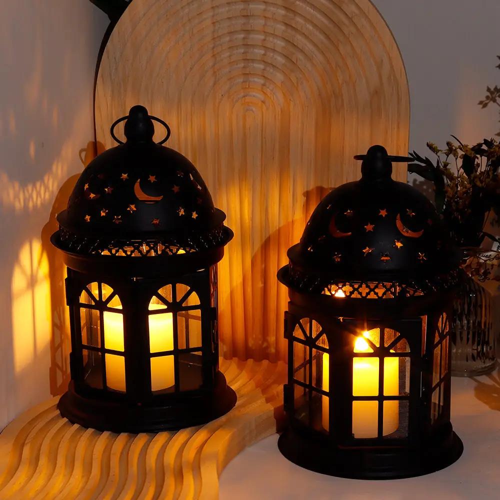 Metal vintage hanging candle lanterns, set of 2 by JHY DESIGN, black with moon and star cutouts.