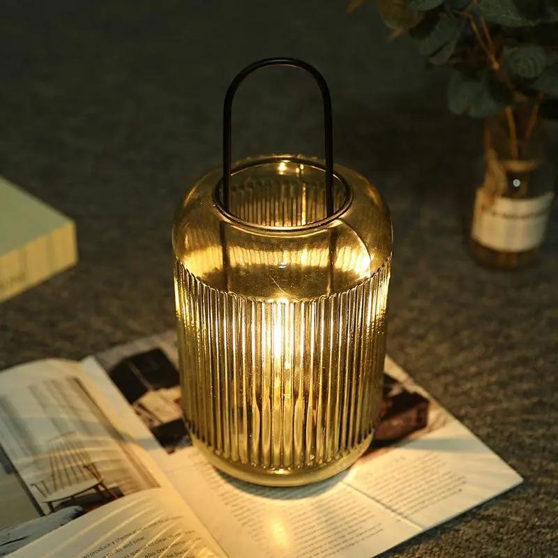 11.5in Battery Powered Table Lamp, amber-green ribbed glass with black handle by JHY DESIGN.
