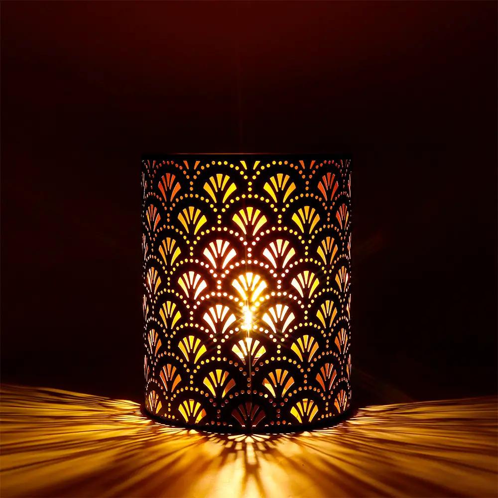 8'' H metal rustic wall-mount lamp, battery-operated, warm amber glow from perforated fan-pattern shade