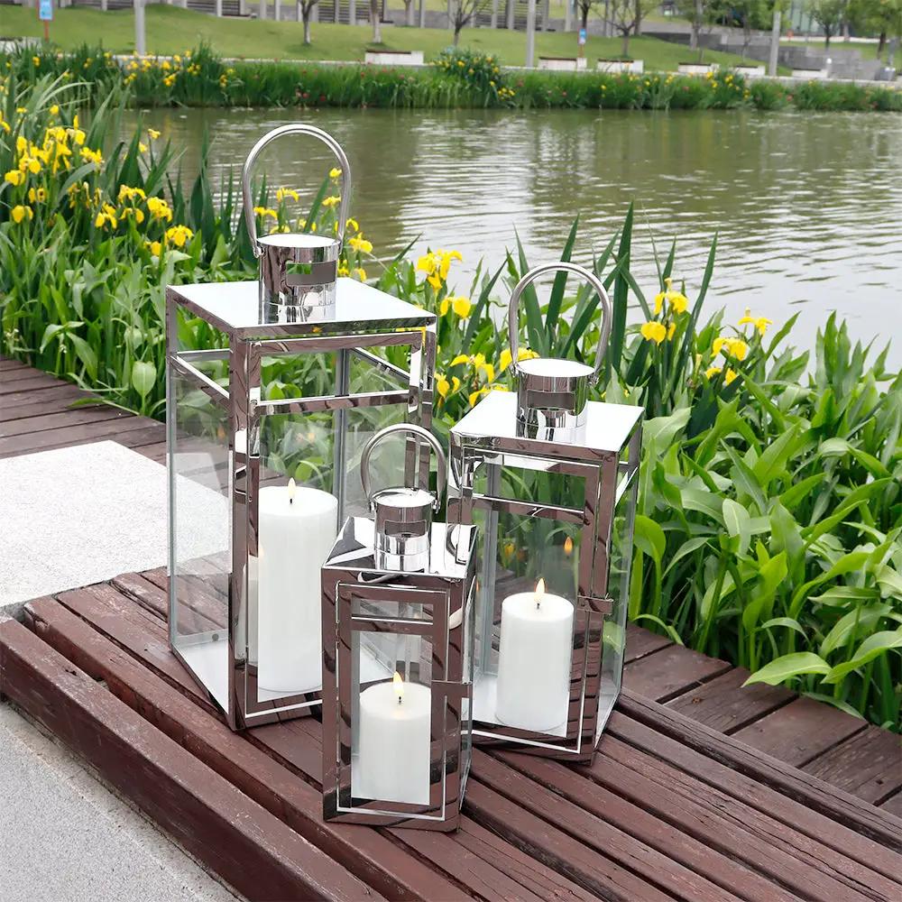 Set of 3 JHY DESIGN stainless steel candle lanterns with clear glass panels in 19, 15 and 12 inches