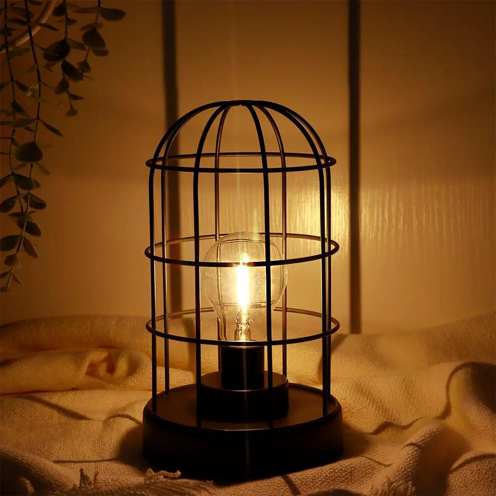 Decorative table lamp, black metal cage, cordless LED bulb by JHY DESIGN, 9.5 in tall