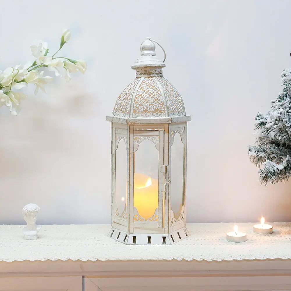 15''H Outdoor candle lantern by JHY DESIGN; vintage white metal with glass panels.