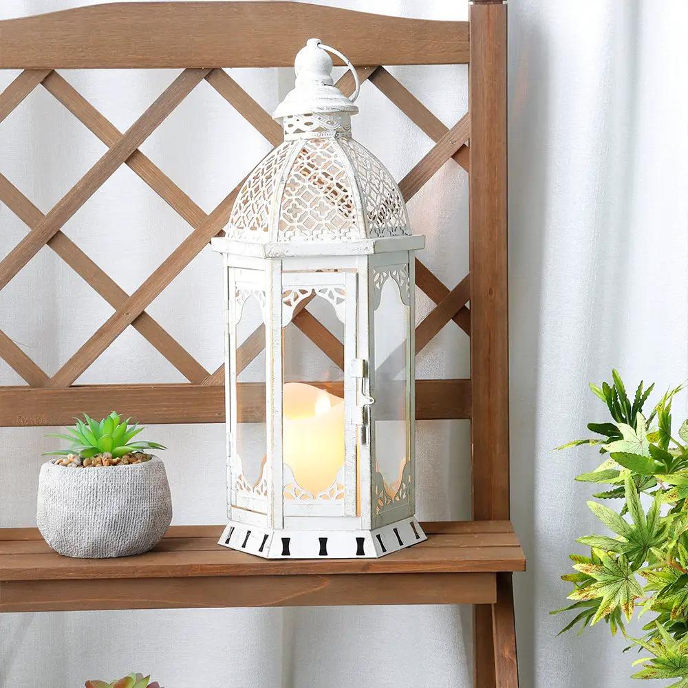 15in Outdoor Candle Lantern by JHY DESIGN, vintage white metal with lattice panels and a lit candle.