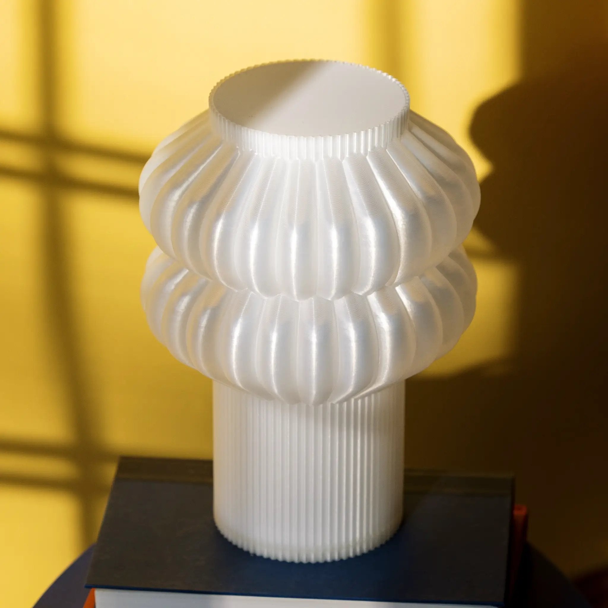 Oppi Table Lamp by Terra Labs; white ribbed glass base for a modern look.