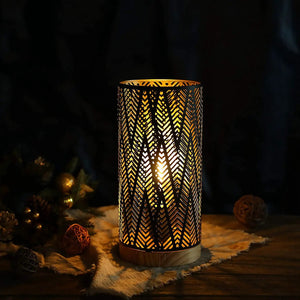 11'' High battery-powered metal lamp by JHY DESIGN with a decorative perforated cylindrical shade.