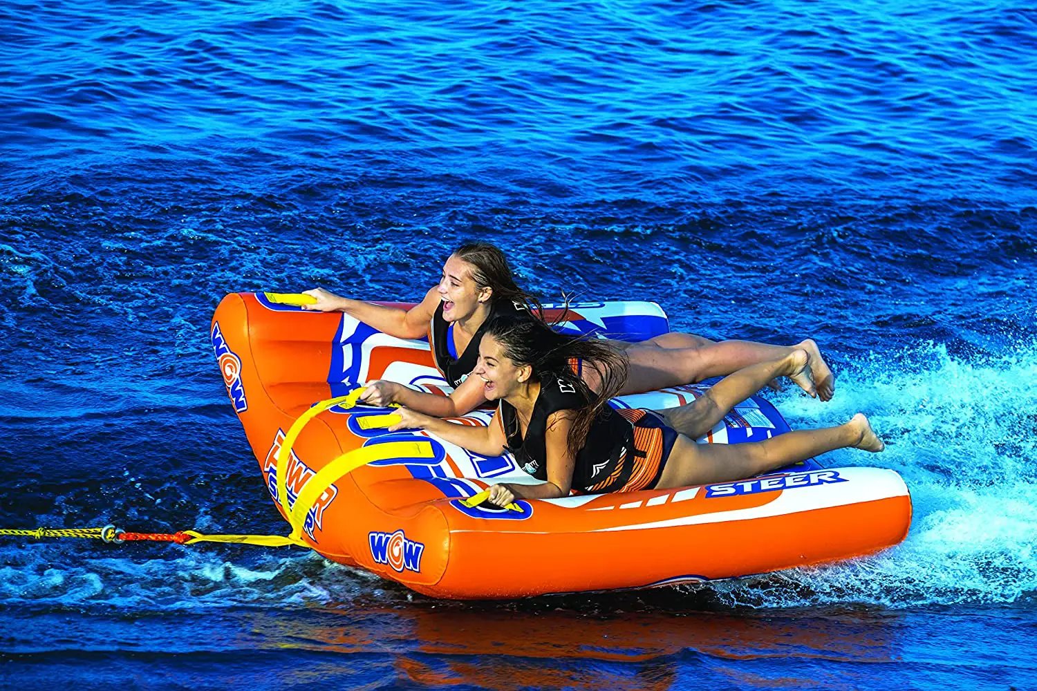 WOW Power Steer 2-Person deck tube towable; orange inflatable with blue/white graphics, 2 riders.