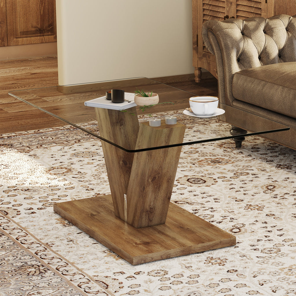 A modern minimalist style coffee table. Transparent tempered glass tabletop with wooden MDF columns. Suitable for living room and dining room.  CT-V
