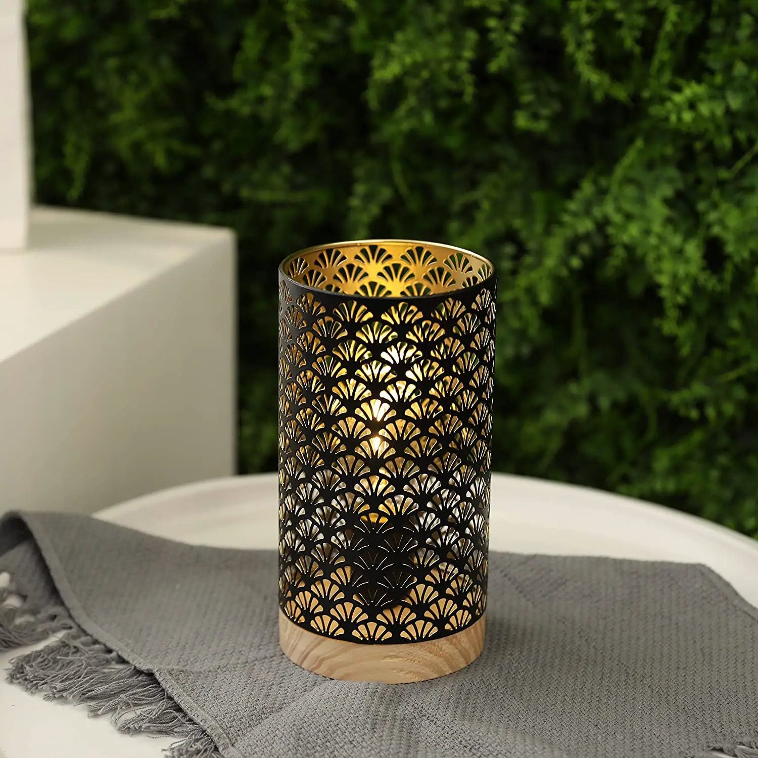 7.5-inch cordless metal lamp by JHY DESIGN with a black perforated exterior and gold interior.