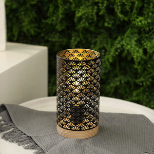 7.5-inch cordless metal lamp by JHY DESIGN with a black perforated exterior and gold interior.
