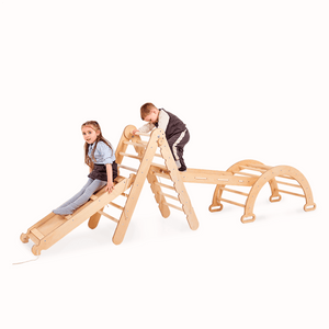 Goodevas 4in1 Montessori climbing set in beige wood with triangle ladder, climbing arch, and slide.