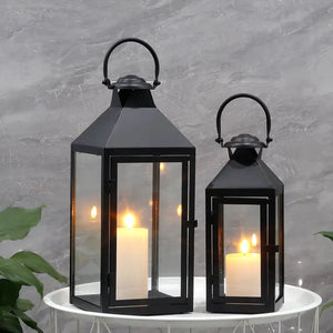 Set of 2 black metal candle lanterns with glass panels, 17.5 in and 13.5 in tall, JHY DESIGN