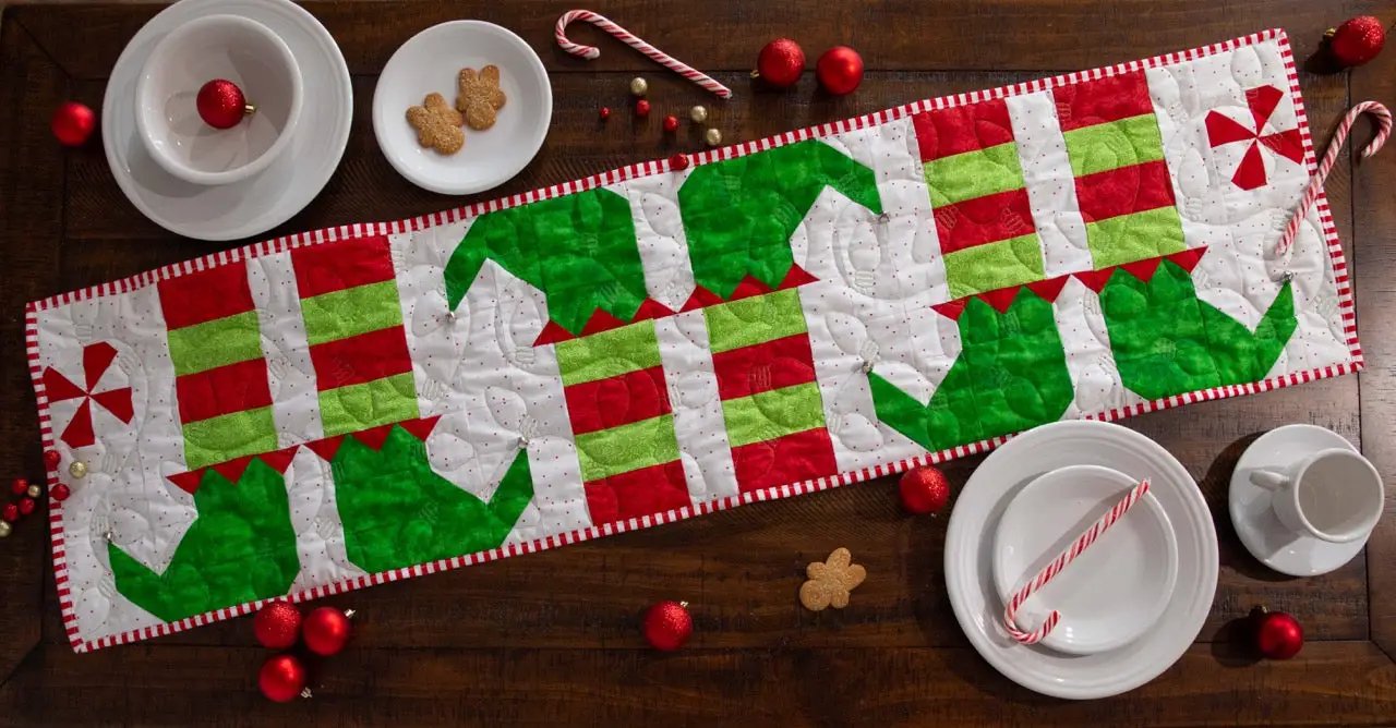 Elf Feet Christmas Table Runner precut quilt kit by Block Party Quilt Co in red, green, and white