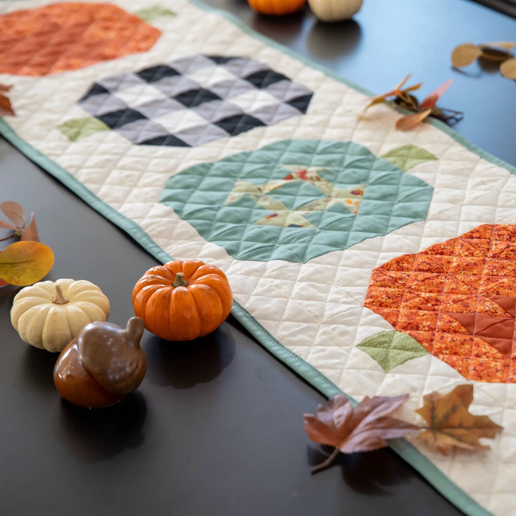 Pumpkin Patchwork Quilted Table Runner Precut Quilt Kit by Block Party Quilt Co in autumn teal, orange, and cream