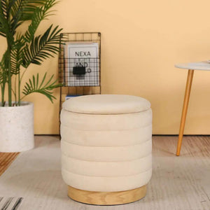 Storage ottoman in cream velvet by JHY DESIGN; 16.5in tall with wooden base.