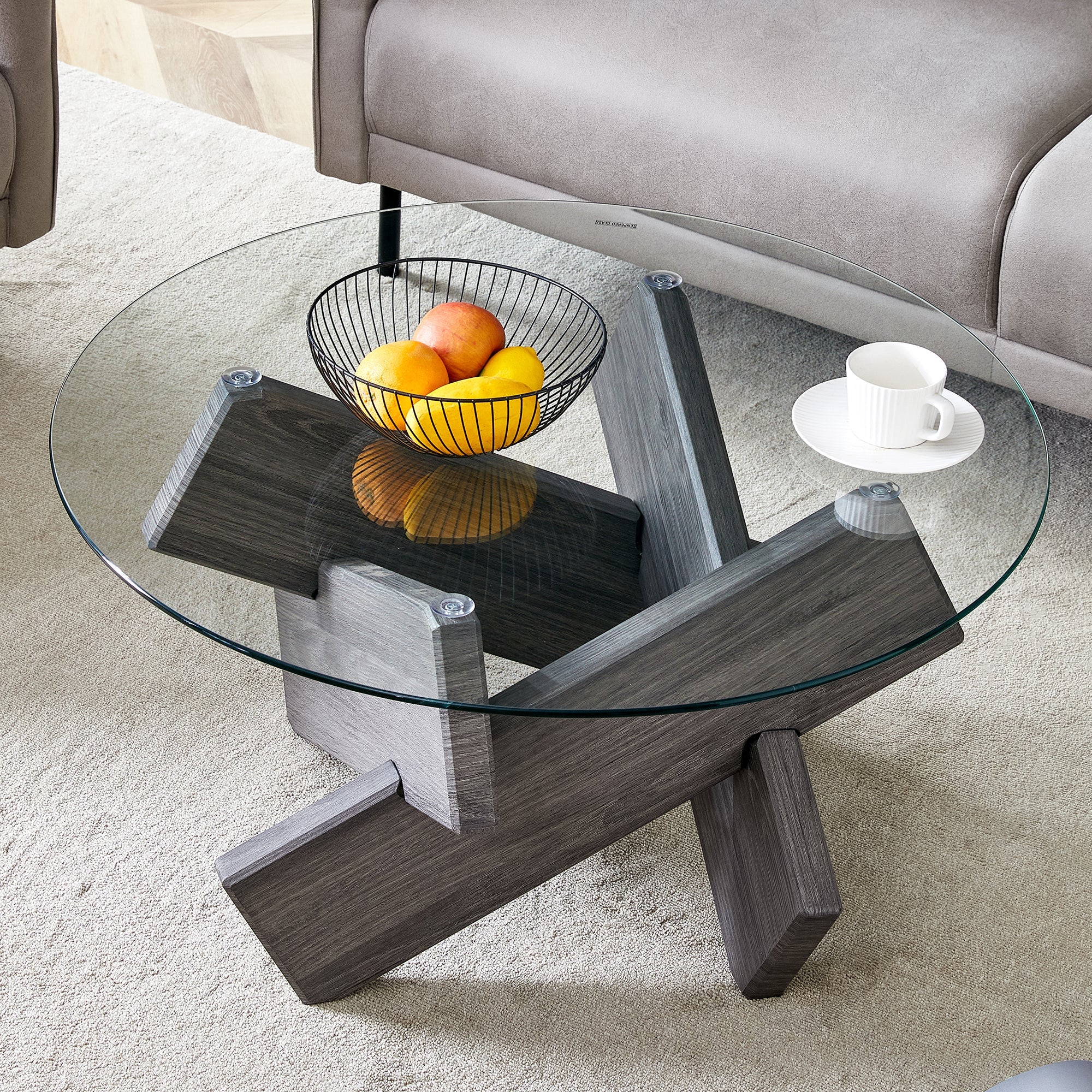 Round glass coffee table, 33.4" modern design unique coffee table. Tempered glass top with grey patterned MDF legs. Suitable for living and dining rooms
