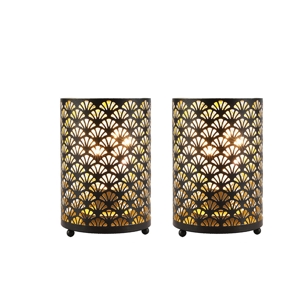 Set of 2 6.5-inch tall metal battery-operated table lanterns with black perforated fan-patterns and warm glow.