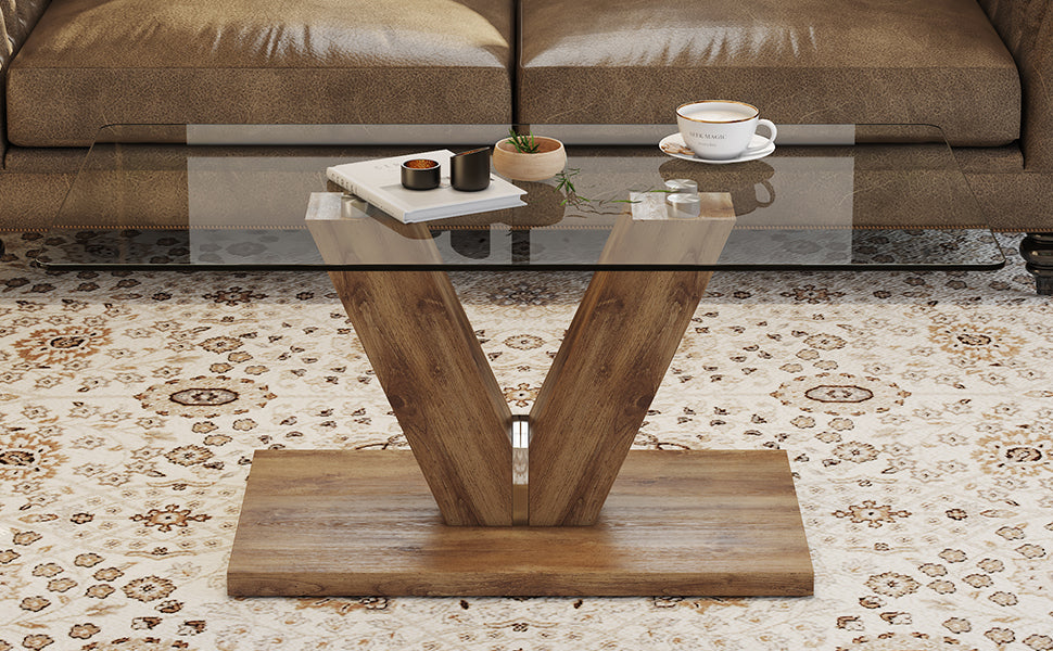 A modern minimalist style coffee table. Transparent tempered glass tabletop with wooden MDF columns. Suitable for living room and dining room.  CT-V