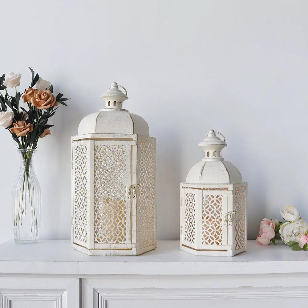 JHY DESIGN decorative candle lanterns, two white distressed metal lanterns with lattice panels, 15 and 11 inches high.