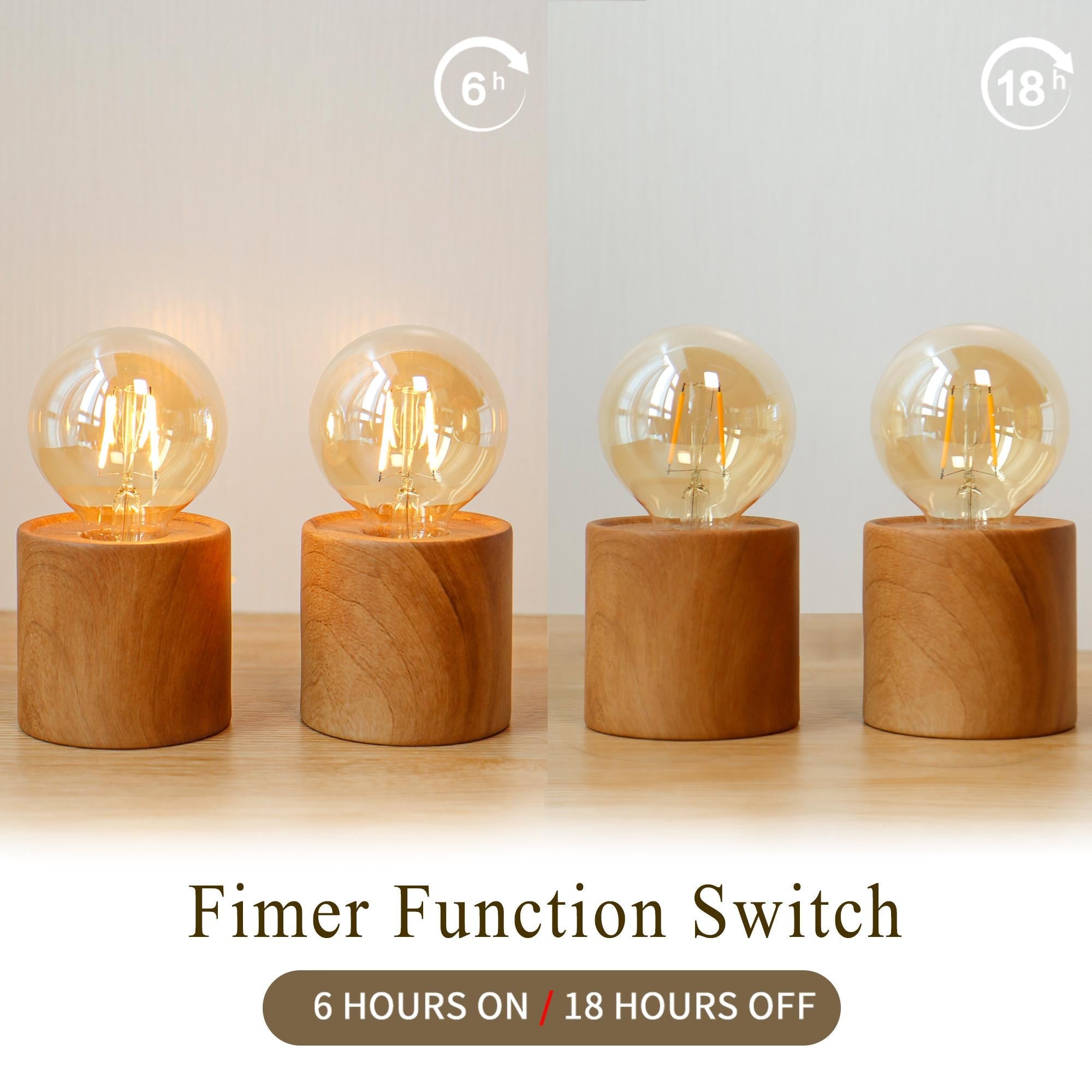 Set of 4 wood grain battery-operated table lamps with clear glass bulbs on wooden bases