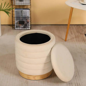 Cream velvet storage ottoman, 16.5 inches tall with a gold base; lid removed to reveal interior storage.