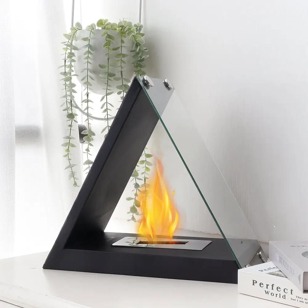 JHY DESIGN glass tabletop fireplace with black triangular metal frame, clear glass panel, gel-fuel flame