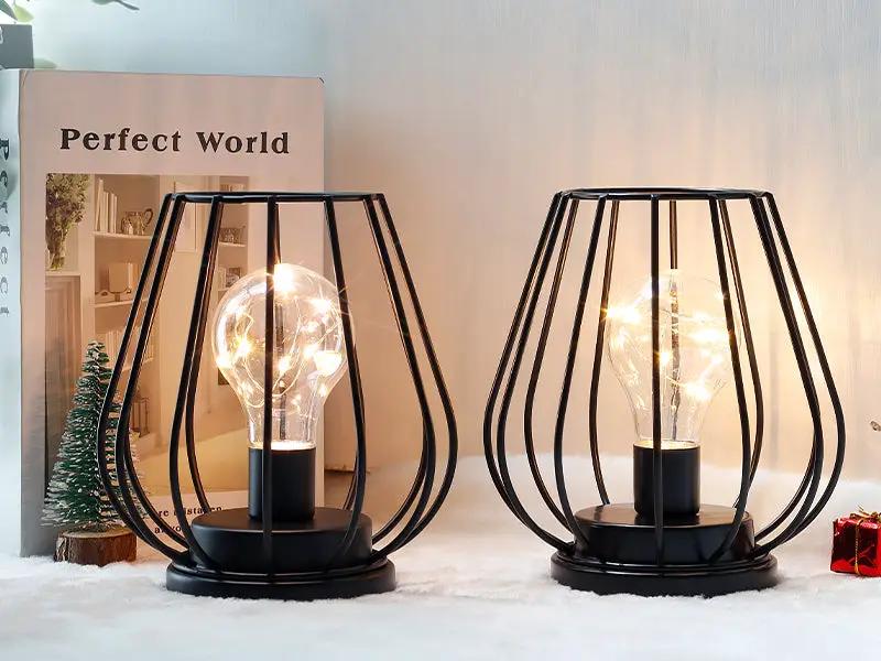 Set of 2 7'' tall metal cage lamps by JHY DESIGN, cordless battery-operated table lights with warm glow bulbs.