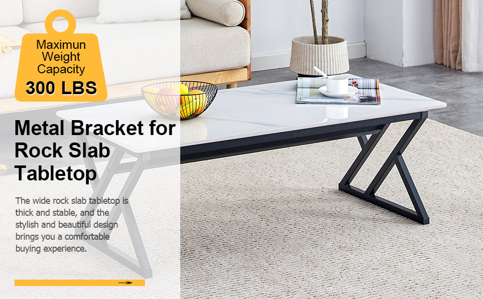 A coffee table made of rock slab material, with a smooth and natural surface that complements the modern design of the black metal legs, making it suitable for living rooms of all sizes.47*23.6