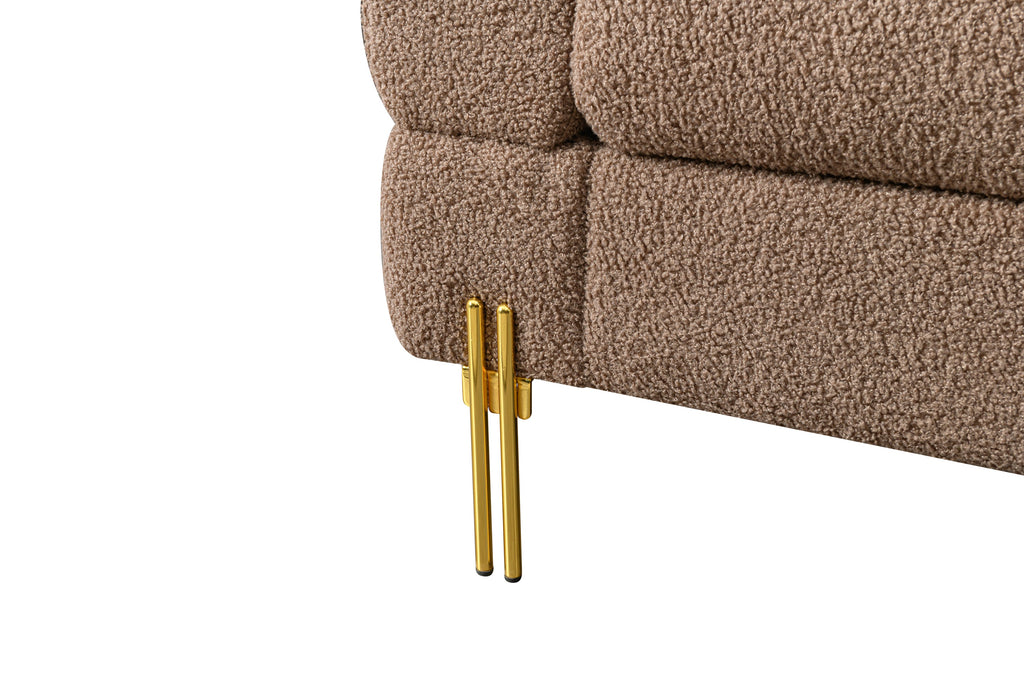 Luxurious and comfortable upholstered sofa with golden legs and pillows for living room and reception area