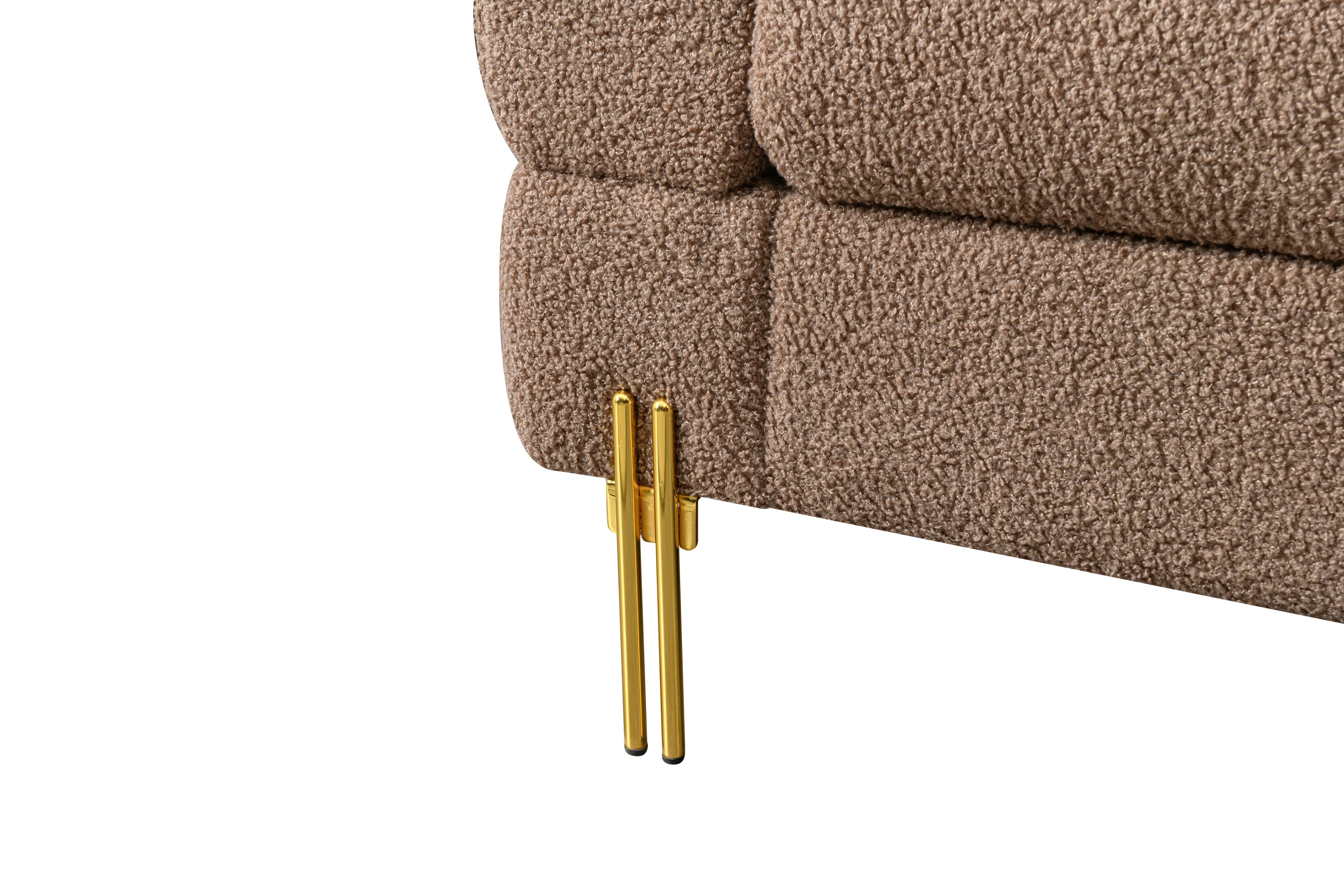 Luxurious and comfortable upholstered sofa with golden legs and pillows for living room and reception area