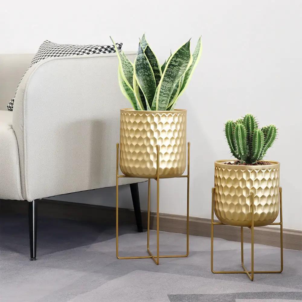 Gold hammered planters on matching stands; 2-pack by JHY DESIGN, 17 and 12 inches tall with greenery