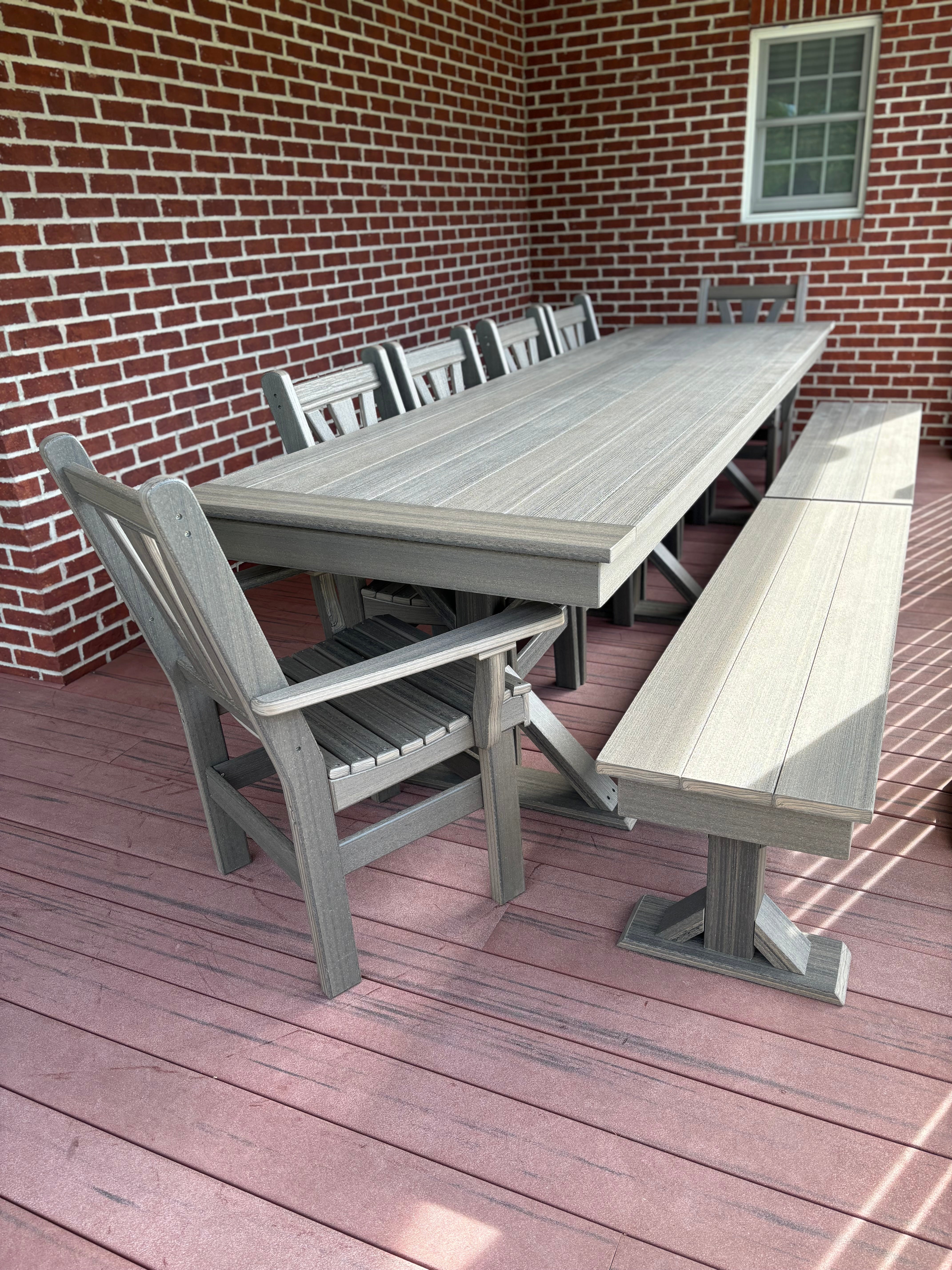 Trestle X Outdoor Bench set in weathered gray wood for outdoor dining by Wooden Whale Workshop.