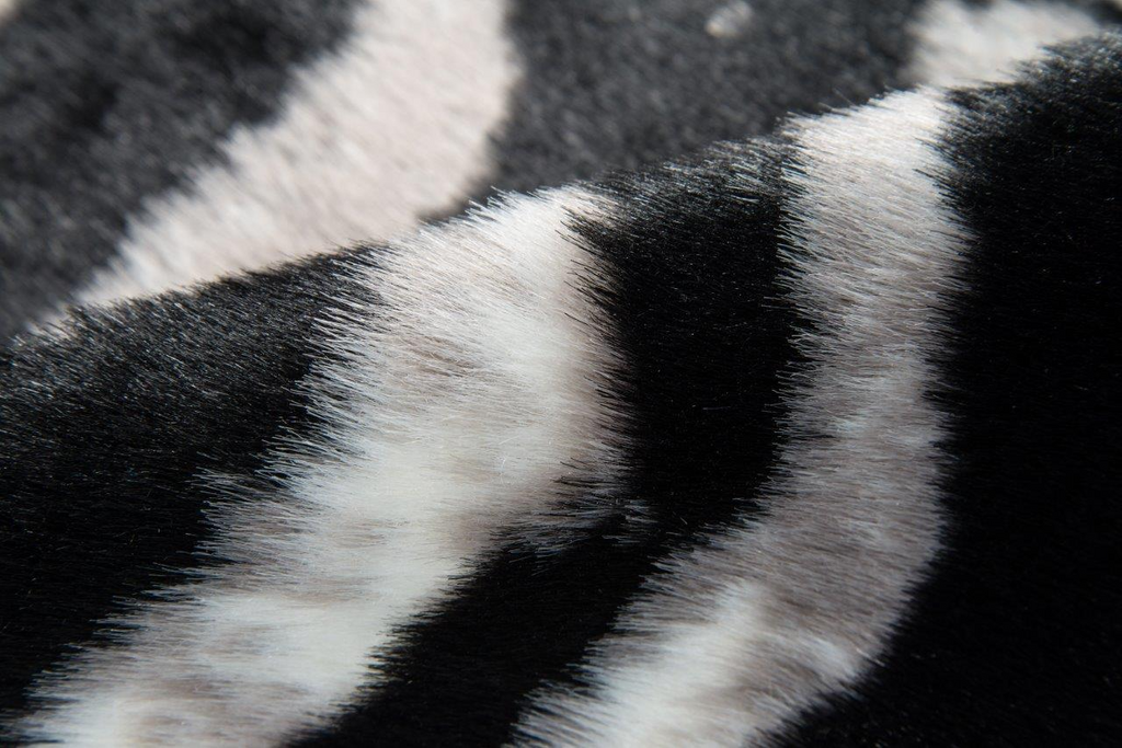 Zebra Hide‑Style Faux Fur Accent Rug