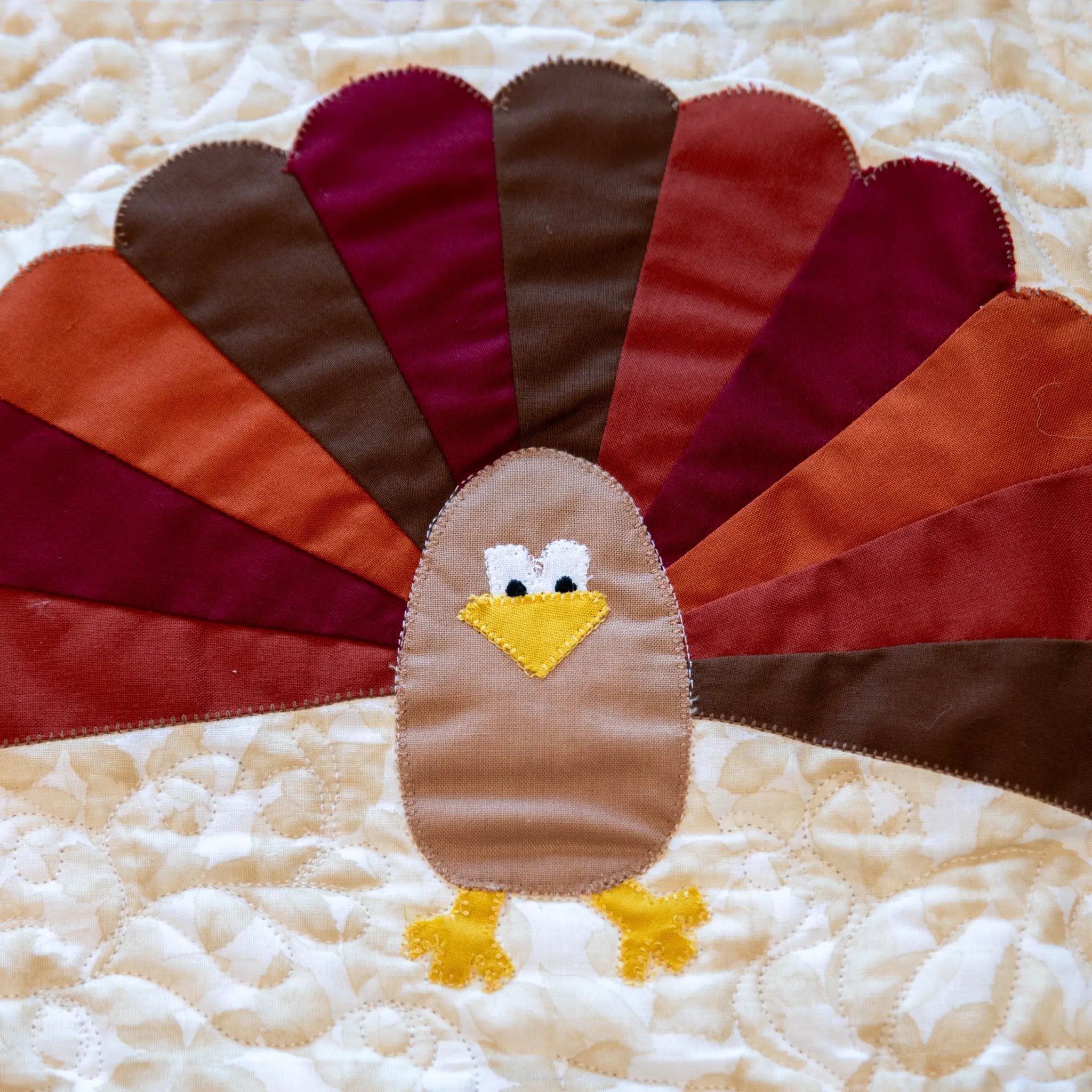 Turkey Thanksgiving table runner precut quilt kit with backing in autumn browns, oranges, and yellows