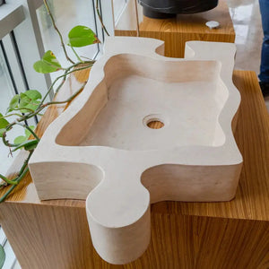 Villohome natural beige travertine bathroom sink with puzzle-shaped edges, above-counter vanity basin