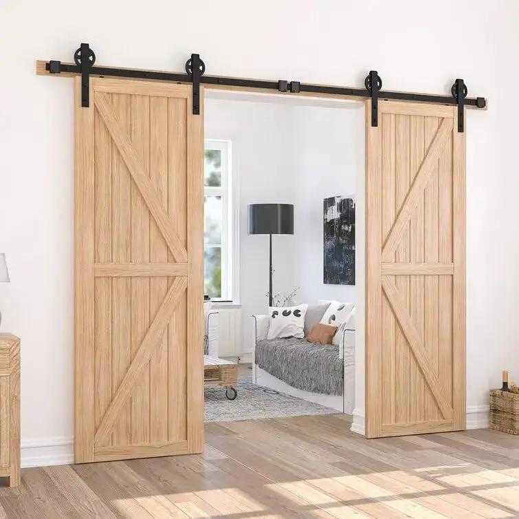 HAUSVITA Big Spoke Wheel sliding barn door hardware kit in black track with two light oak doors