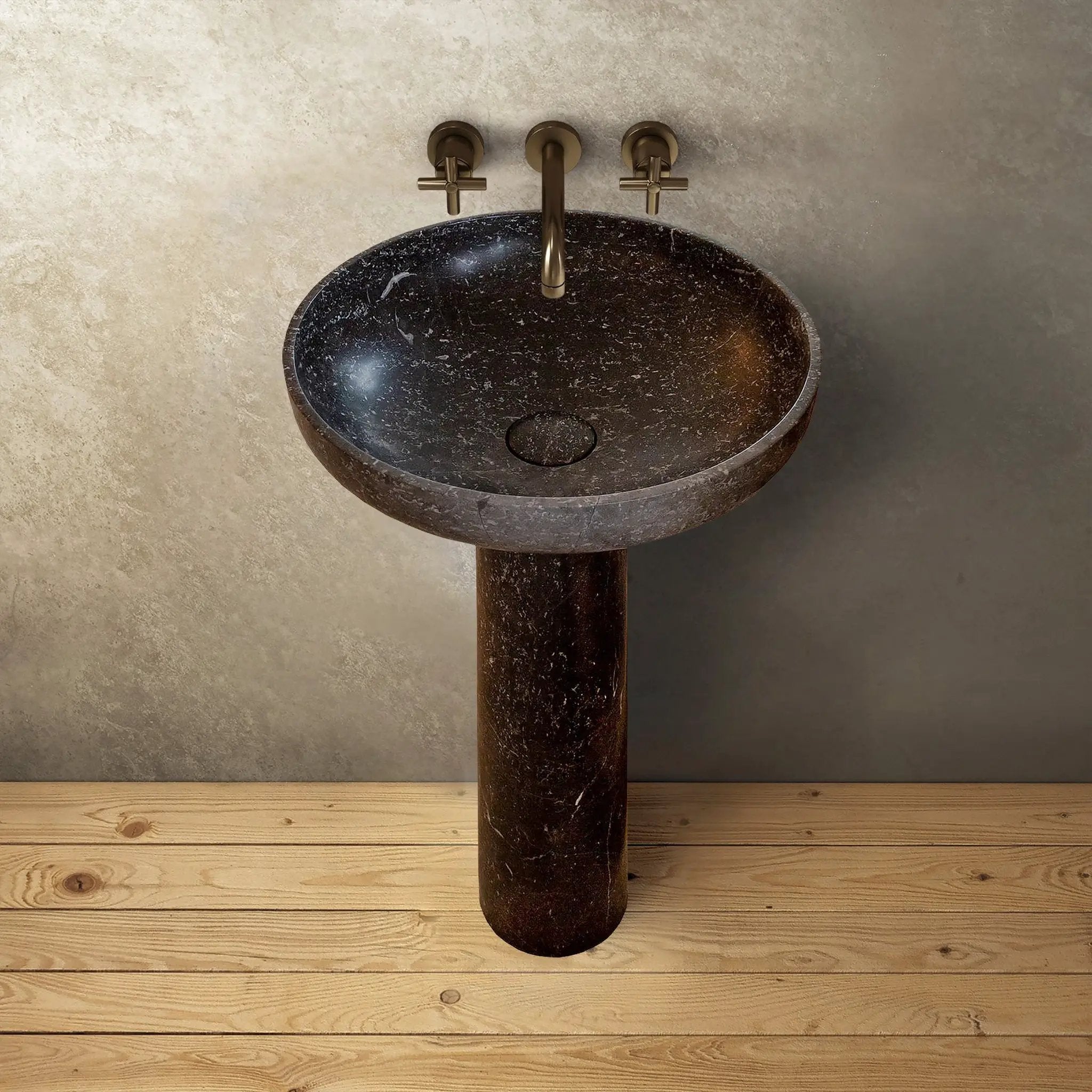 Natural stone black marble stand-alone pedestal bathroom sink with bronze cross-handle faucet