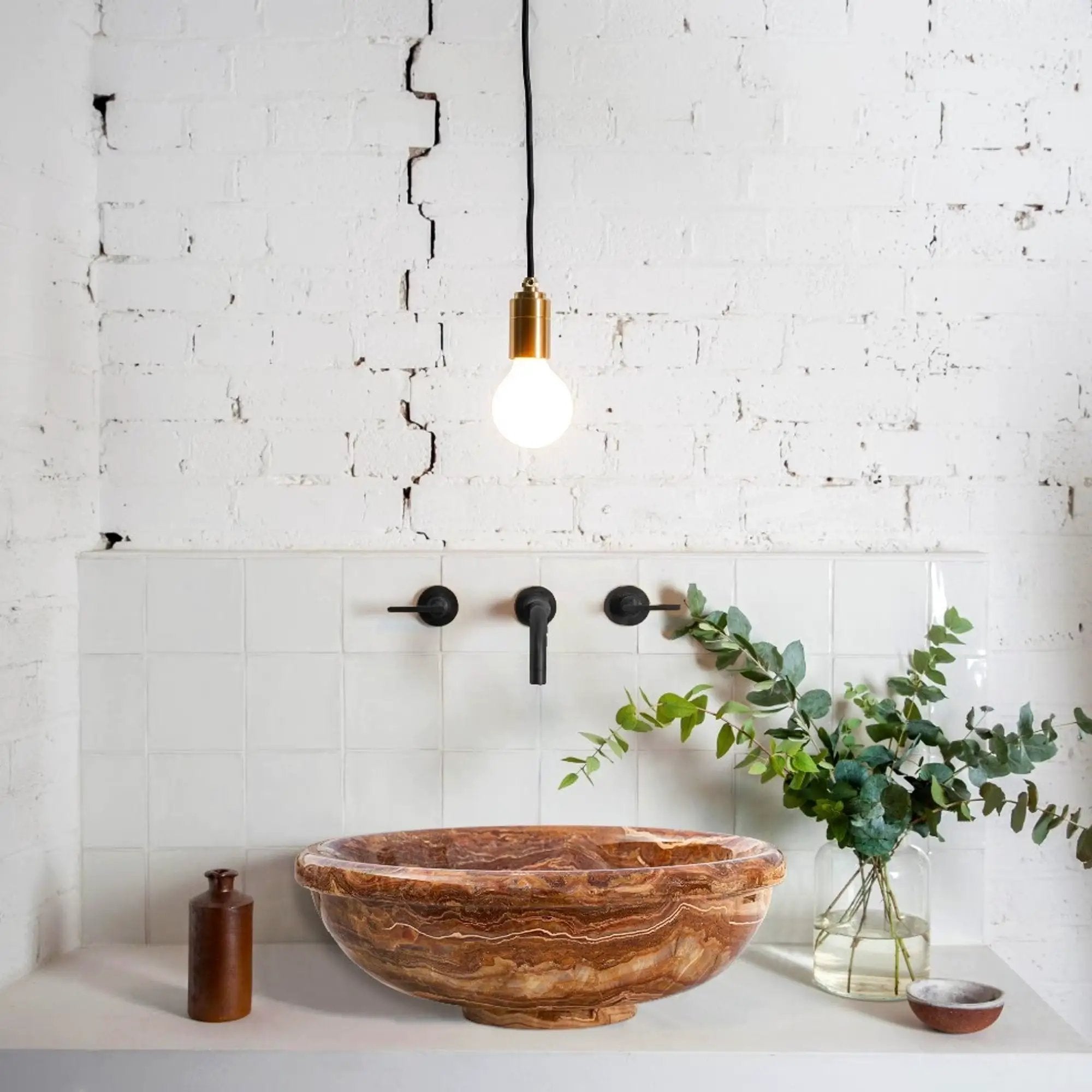 Brown onyx translucent vessel sink by Villohome; polished natural stone bathroom sink