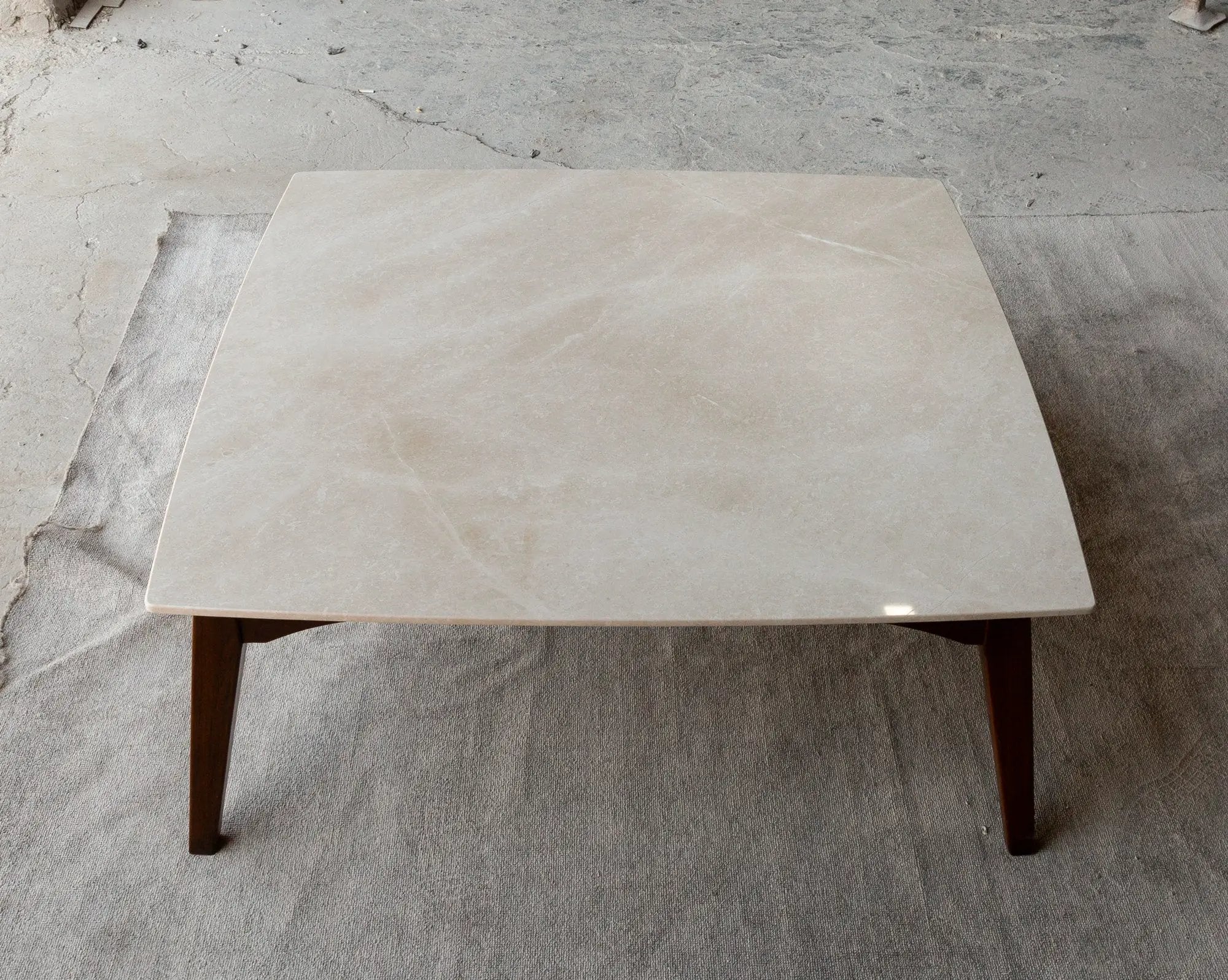 Coffee table Burdur beige marble, rectangular top with polished, eased edges and wooden legs