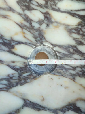 Calacatta Viola marble oval bathroom sink by Villohome with metal drain ring